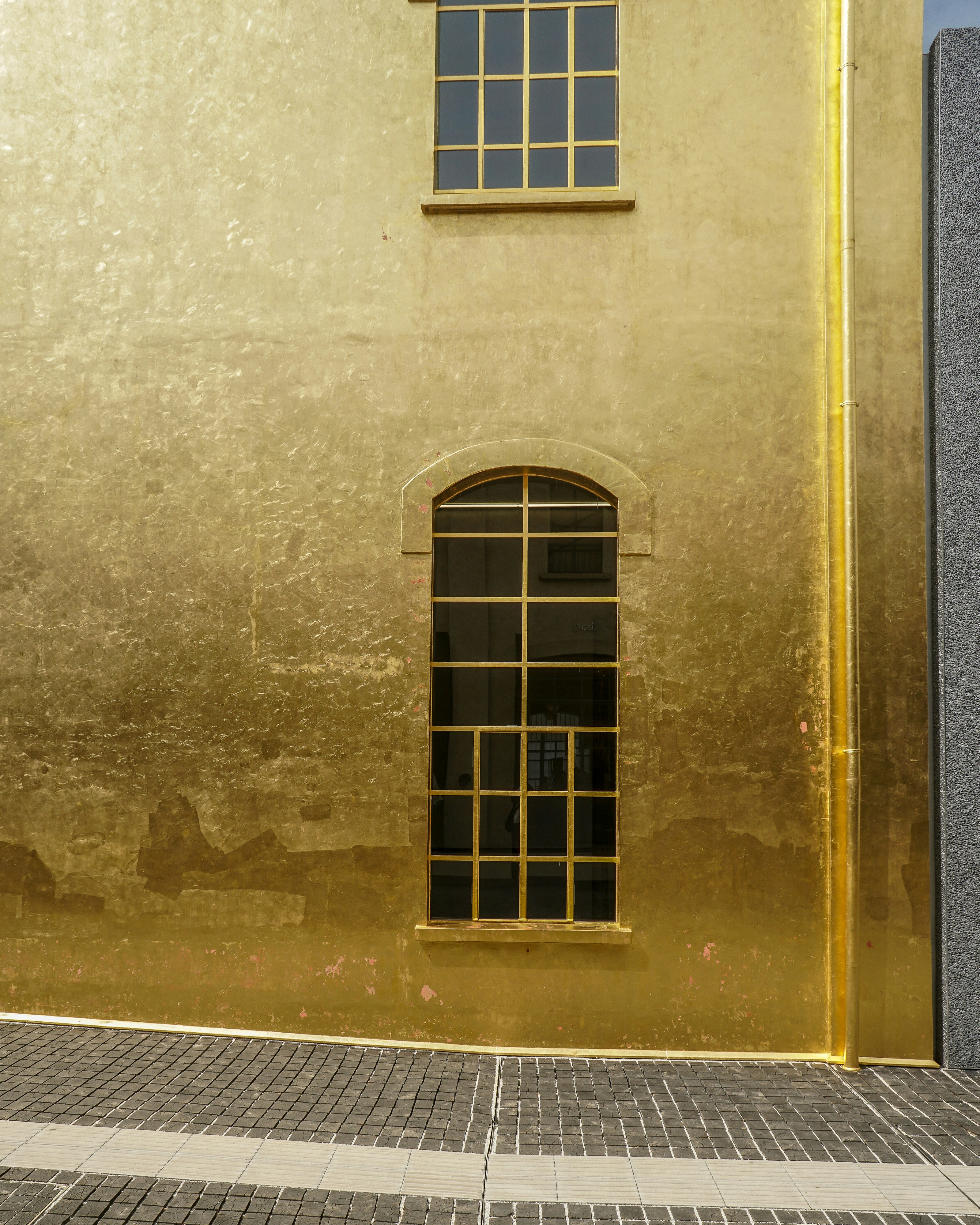 Gold building at the Prada Fondazione, by OMA architect