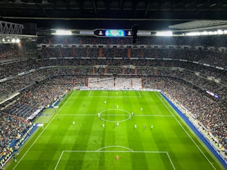 aerial photography of soccer game inside stadium