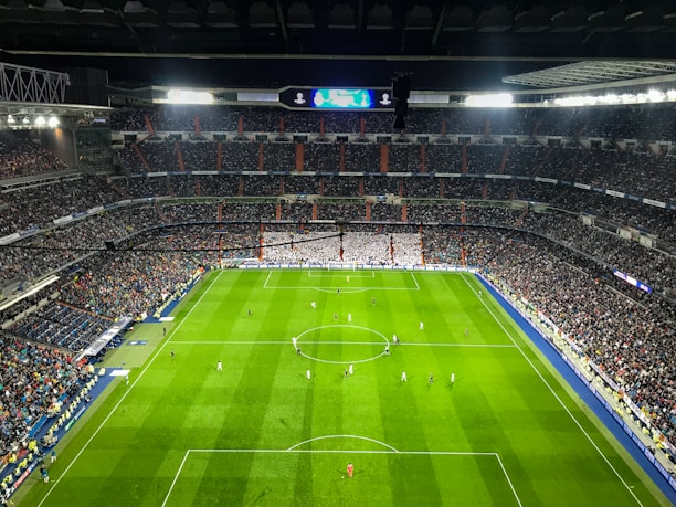 aerial photography of soccer game inside stadium