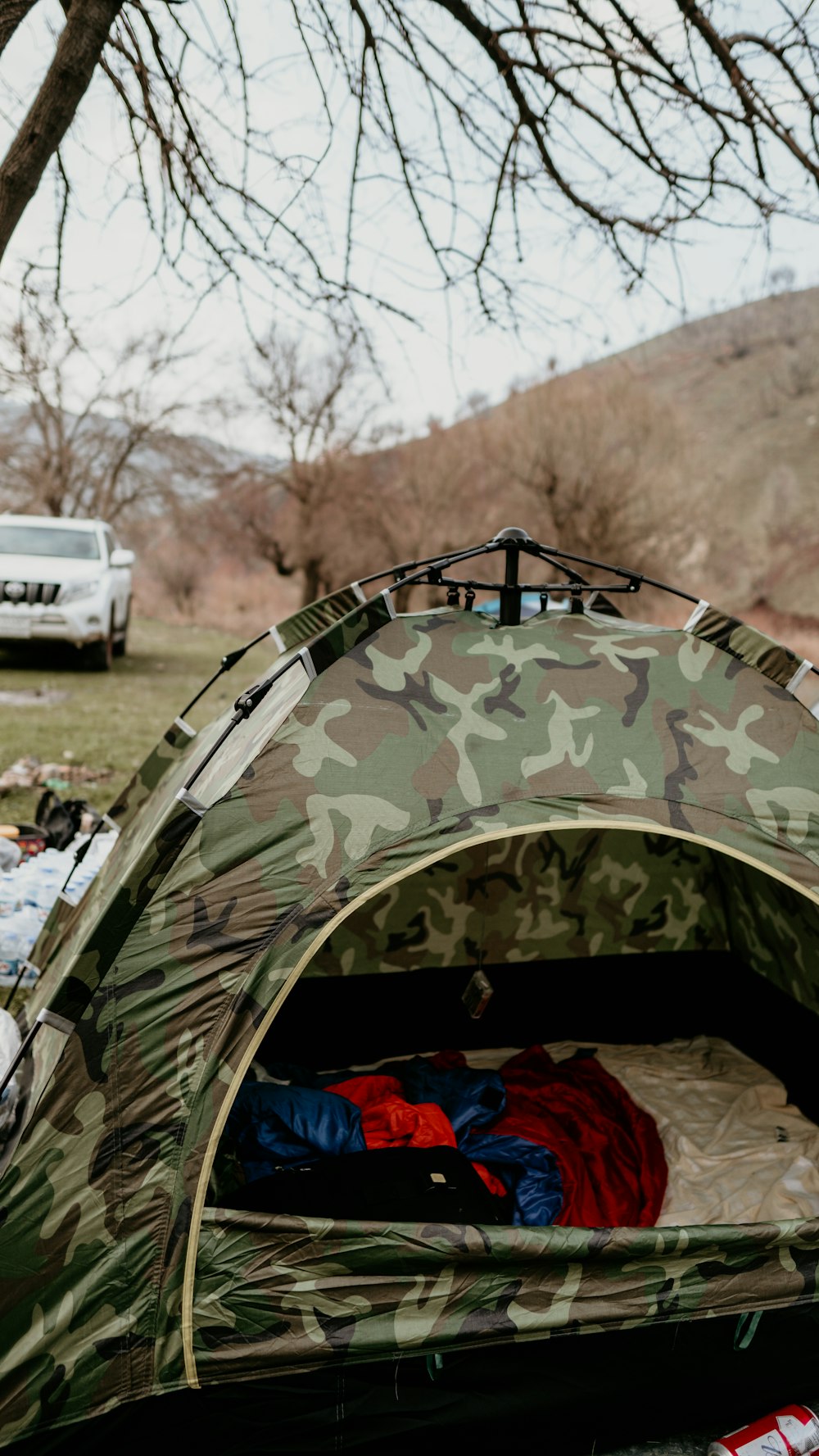 green and brown camouflage tent