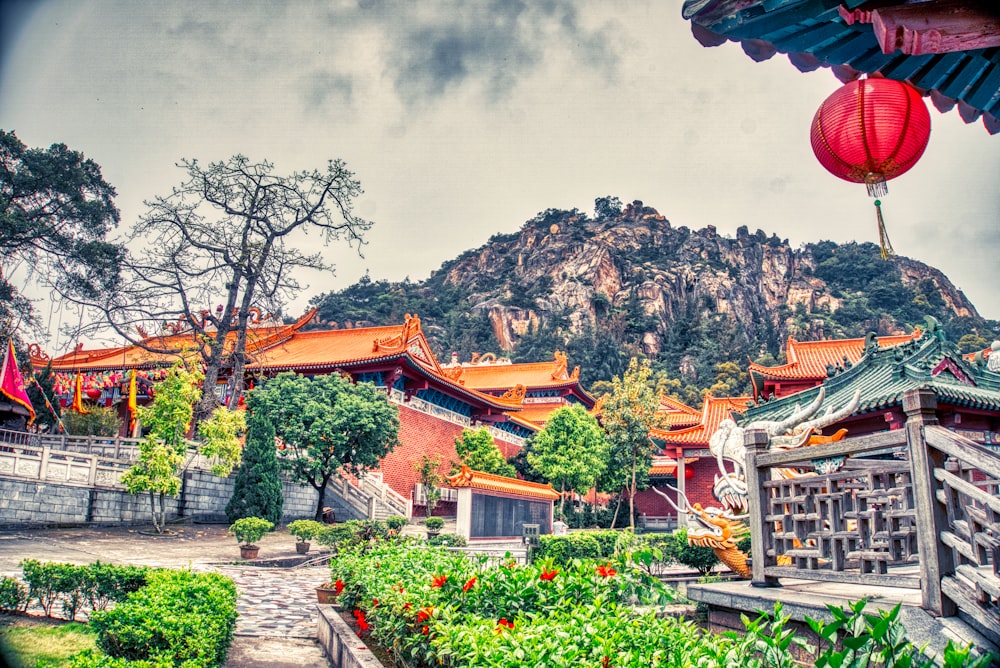 buildings near a mountain during daytime