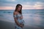 pregnant woman in seashore