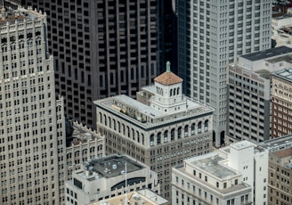 An aerial view of a vibrant cityscape showcasing diverse architecture.