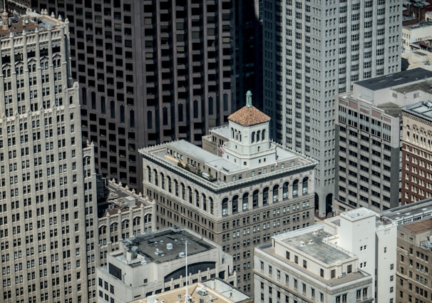 An aerial view of a vibrant cityscape showcasing diverse architecture.