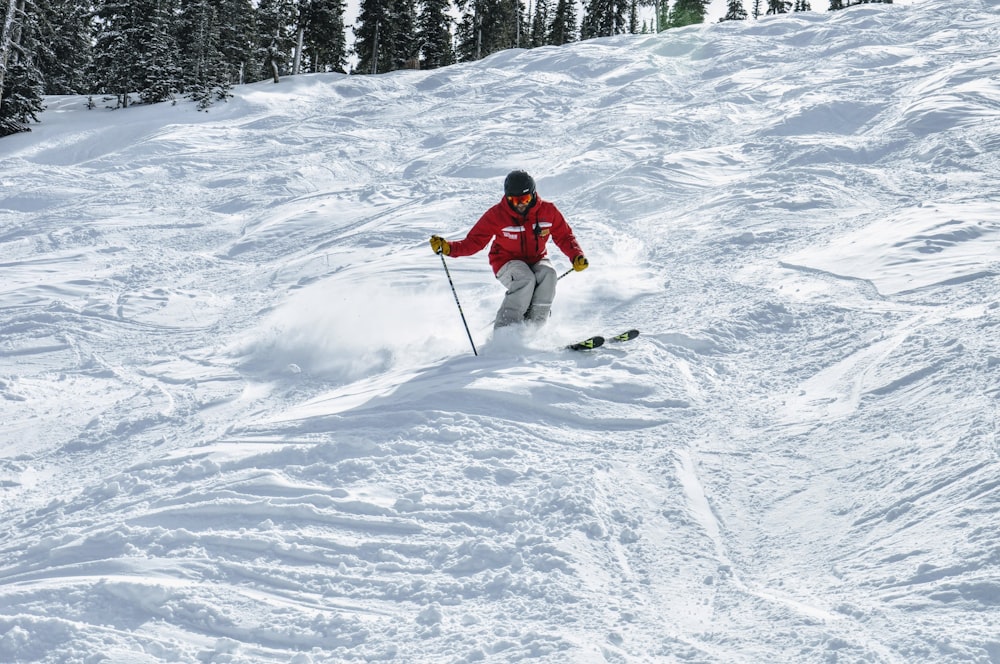 person skiing in a snow during daytime