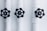 Three pipes with black valve wheels are aligned vertically against a plain background. The pipes and their connecting joints are painted white, contrasting with the dark metal of the valves, which are positioned centrally on each pipe.