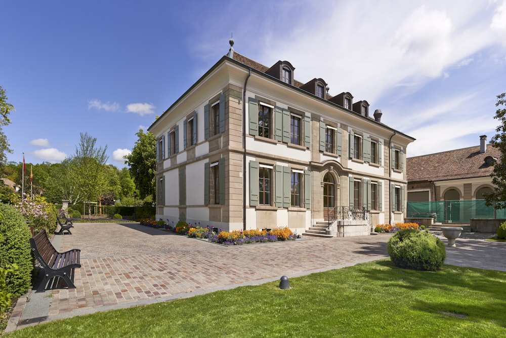 brown and white 2-storey house