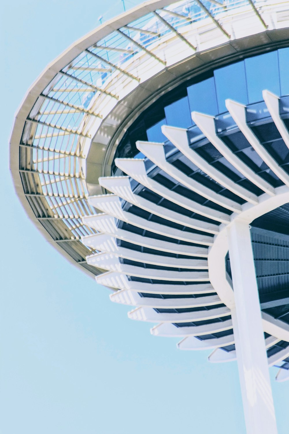 a close up of a very tall building with a sky background