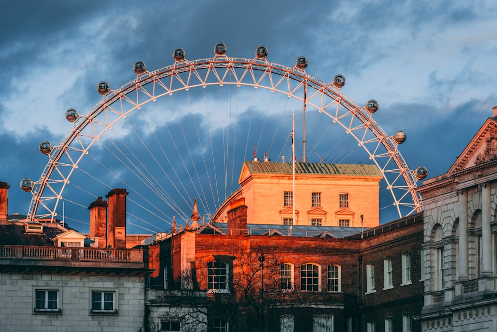 a large ferris wheel on top of a building