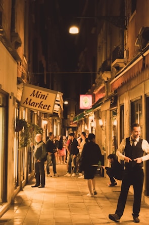 Mo engaging with local small business owners on a busy London street.