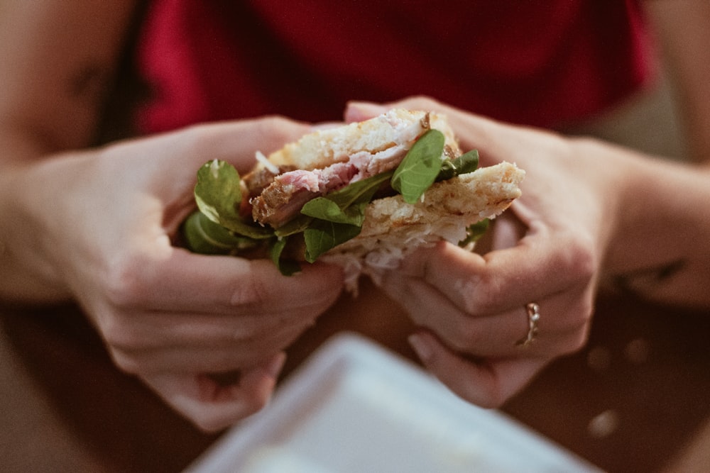 person holding cooked food