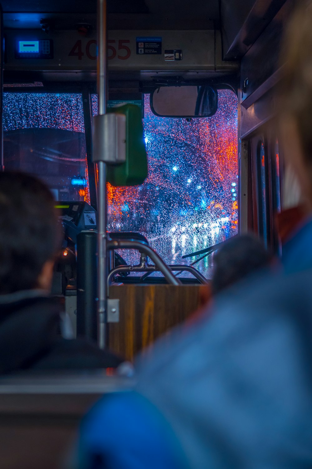 a view of a city from a bus at night