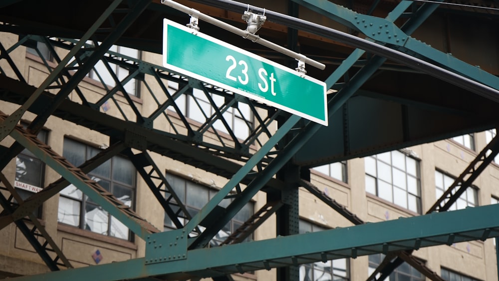 23 street signage hanged on metal bars
