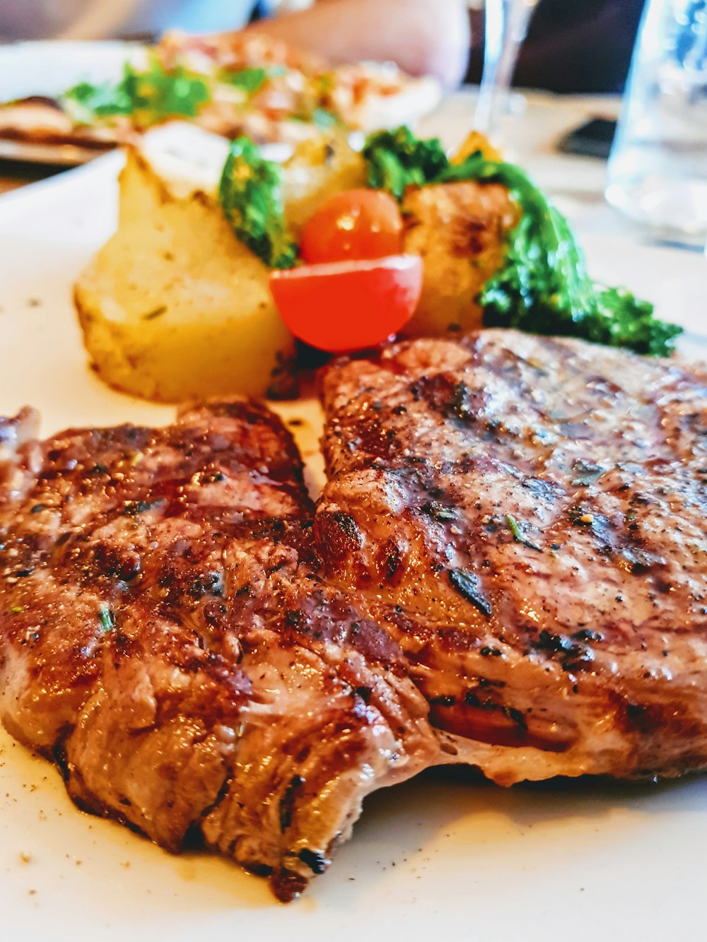 a close up of a plate of food with meat