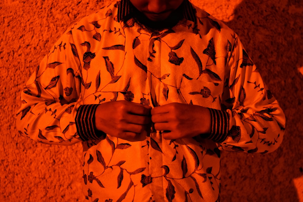 man in white and gray jacket on focus photography