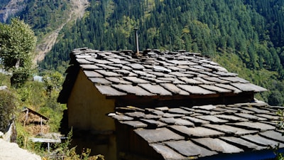 A freshly installed slate roof on a traditional French countryside house.