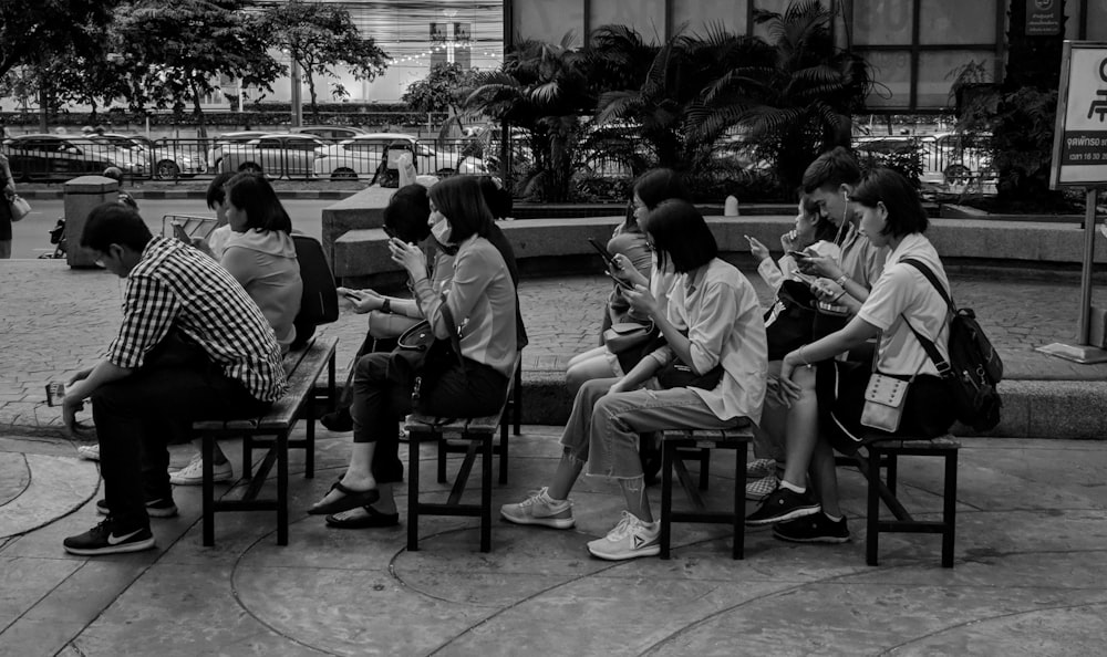 people sitting on benches