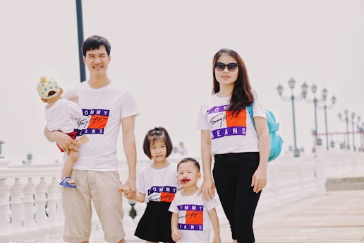 family standing outdoor during daytime