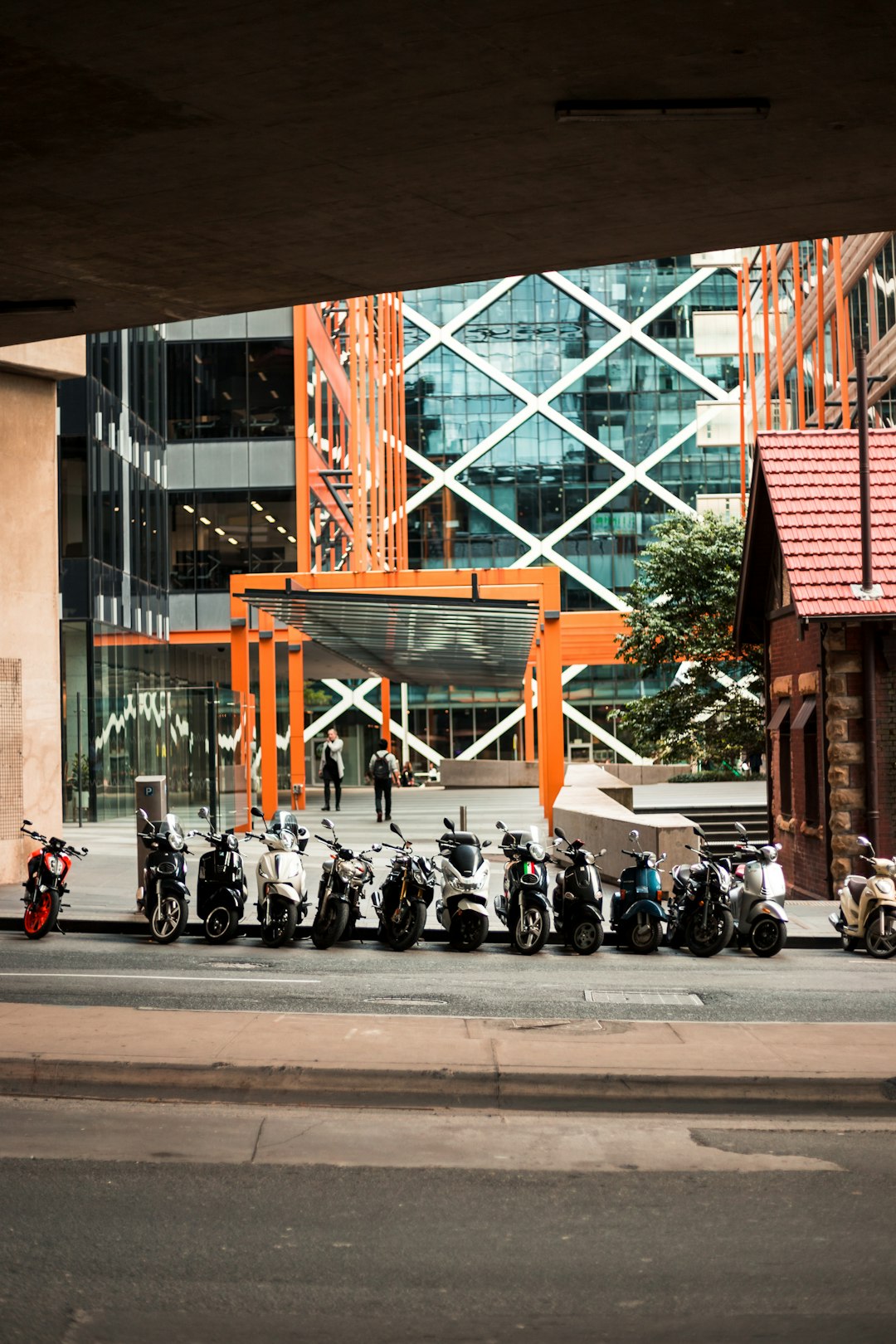 motorcycles parked beside road