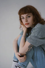 woman sitting on floor