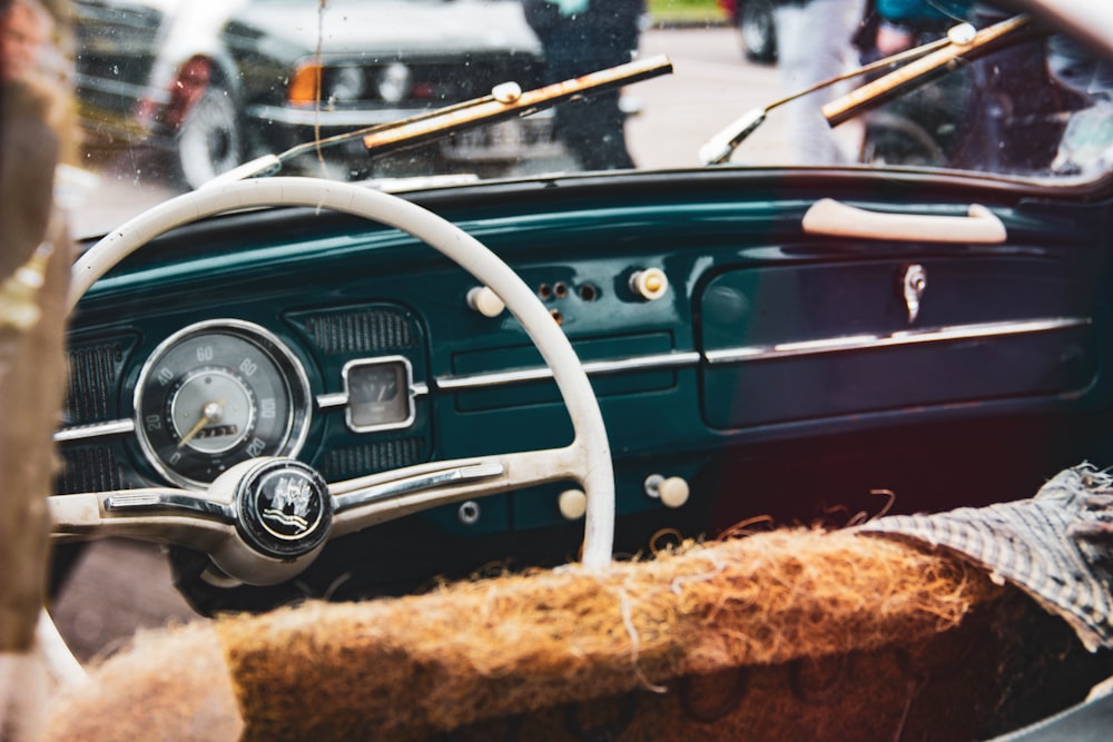 classic car with white steering wheel