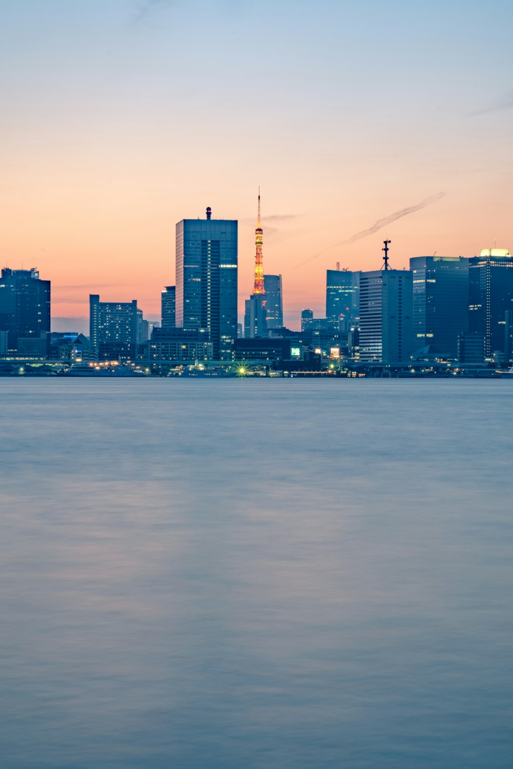 city skyline under golden sky