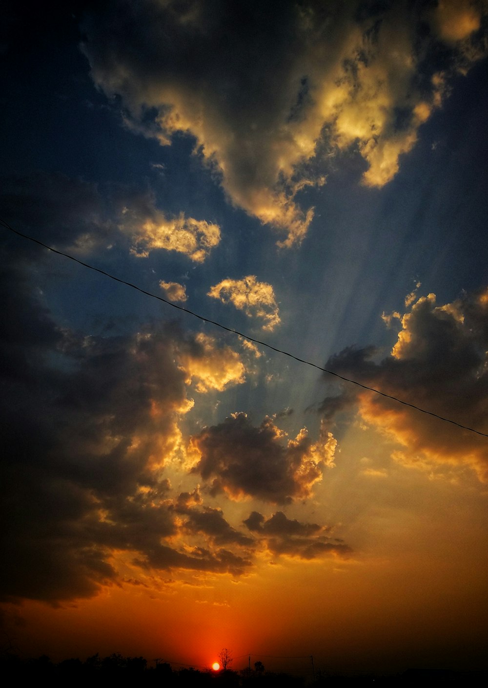 white clouds under blue sky during golden hour