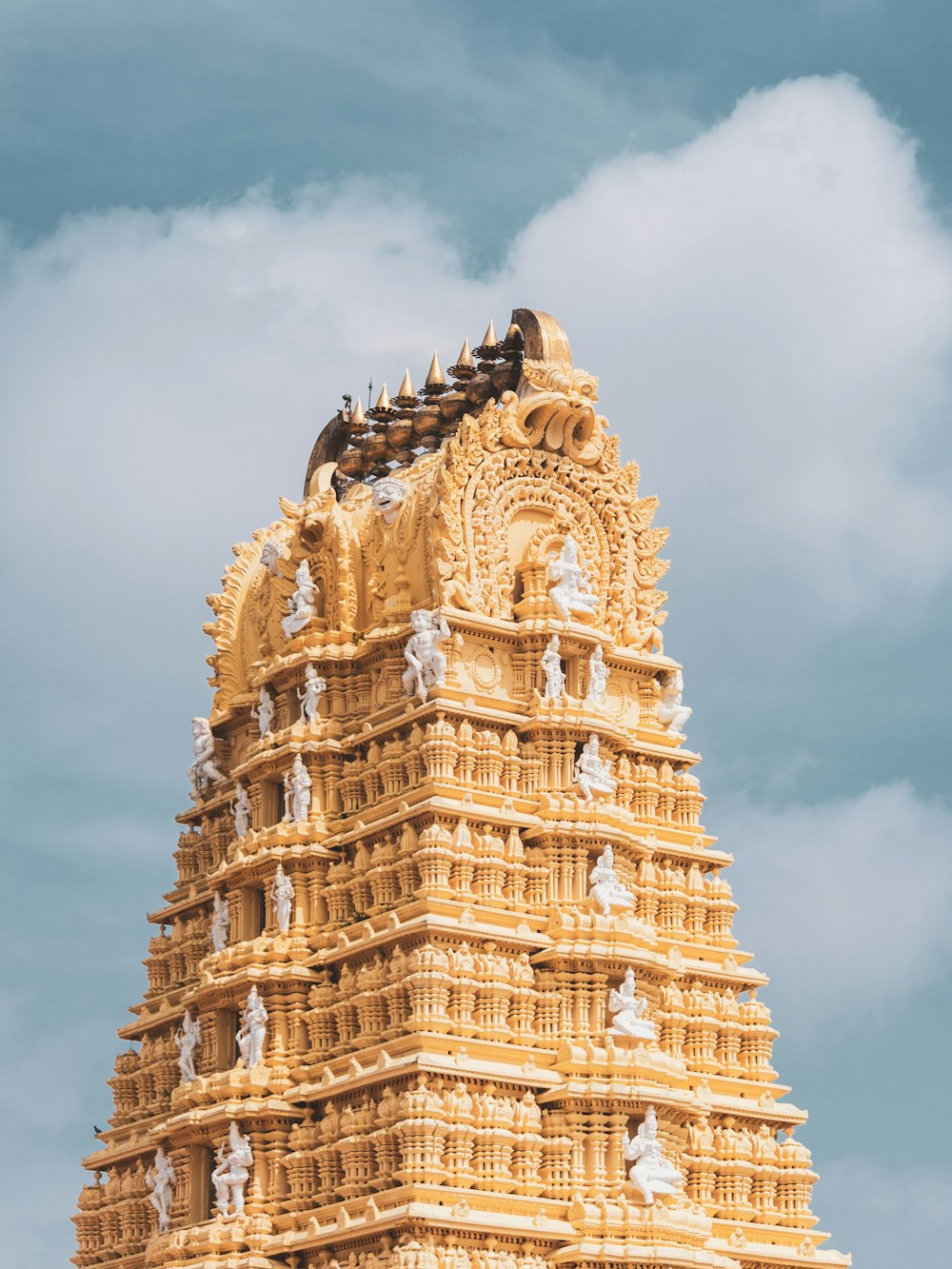 gold and brown high-rise building