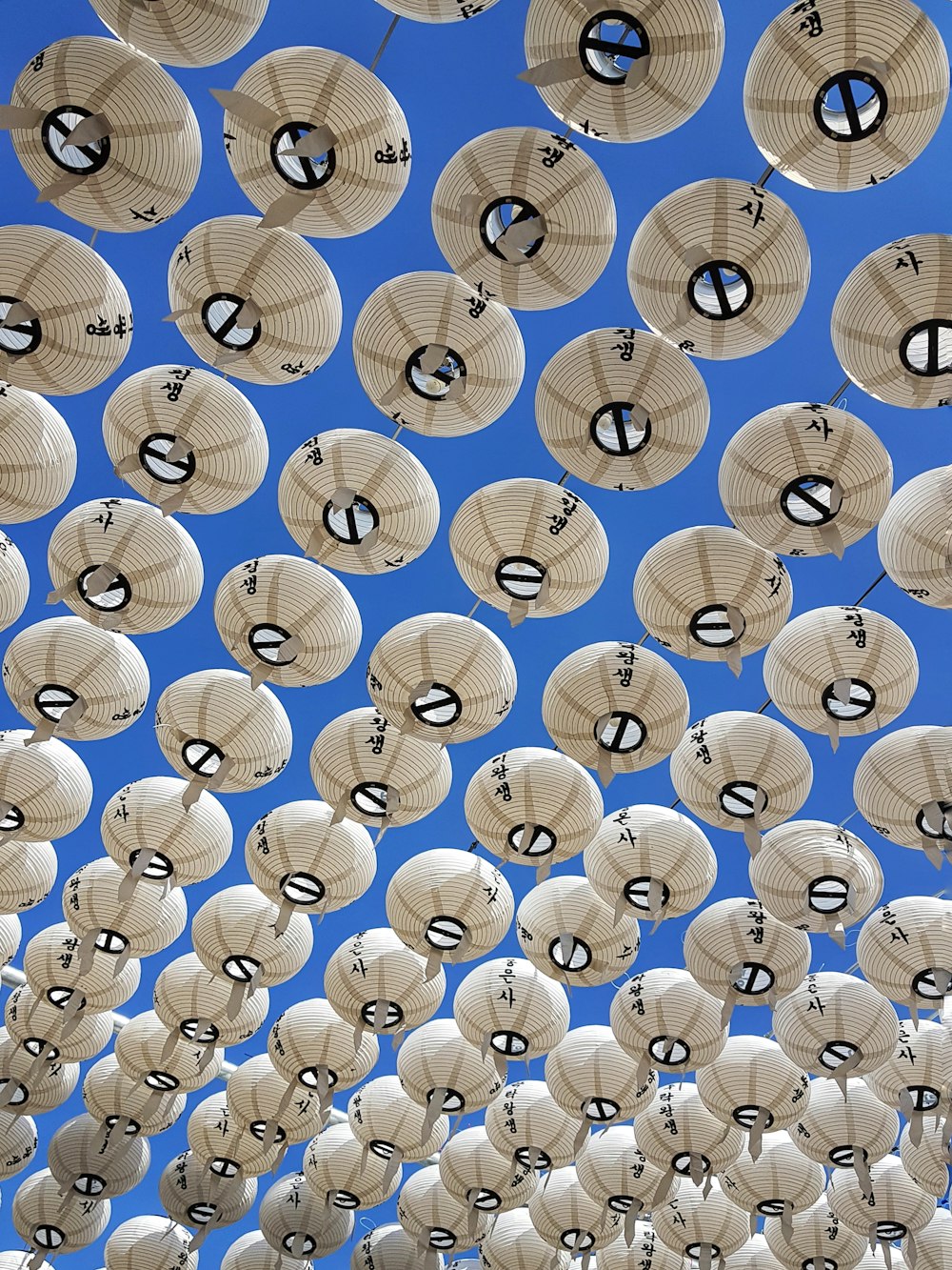 white lanterns during daytime