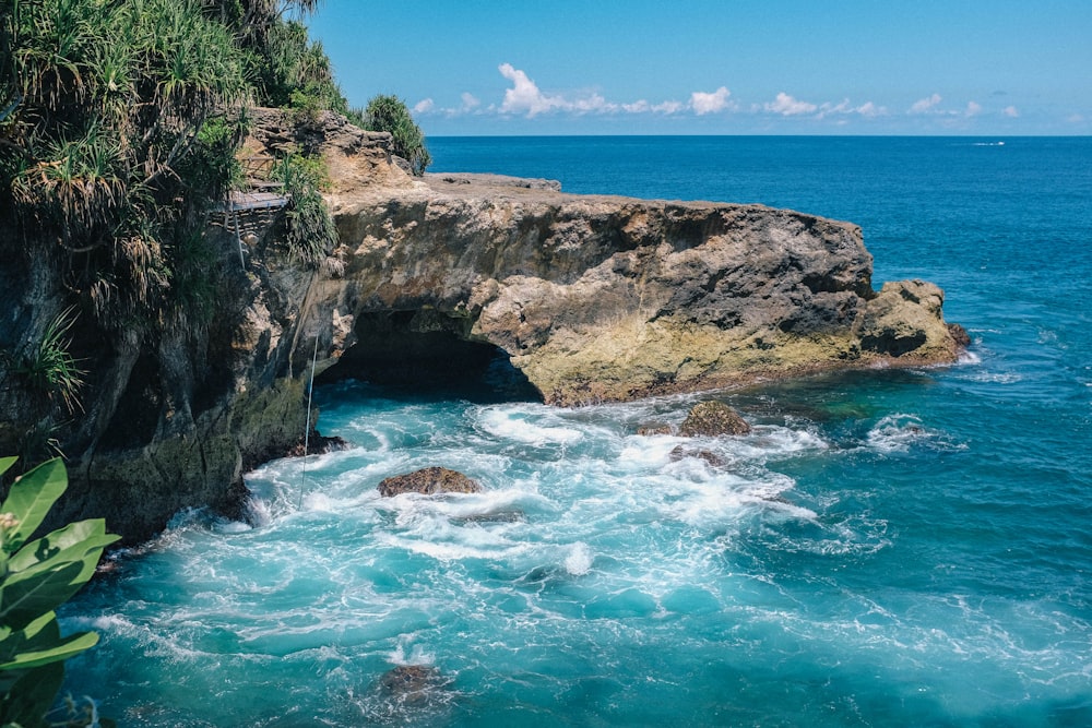 cliff near sea during daytime