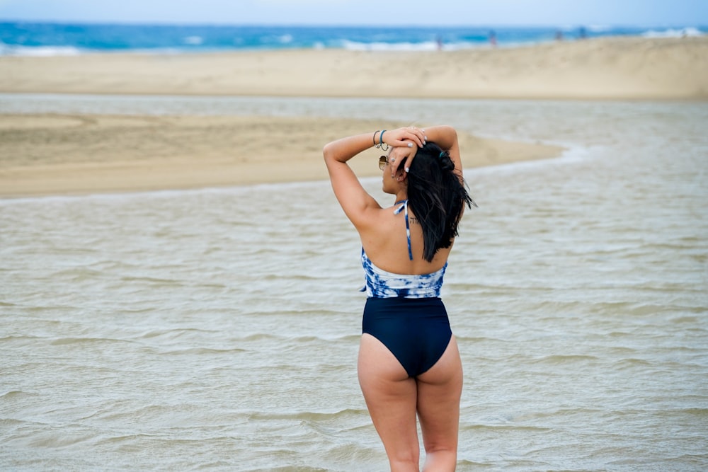 woman in blue and white floral monokini