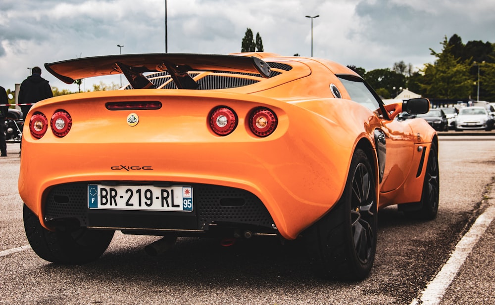 orange coupe during daytime