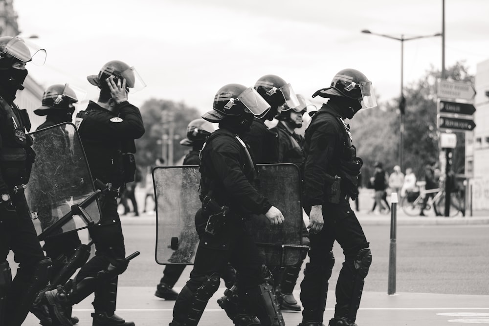 group of police grayscale photo