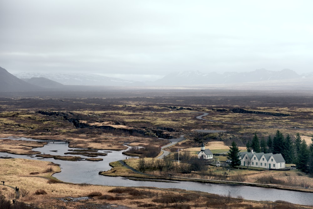 aerial photography of house near body of water