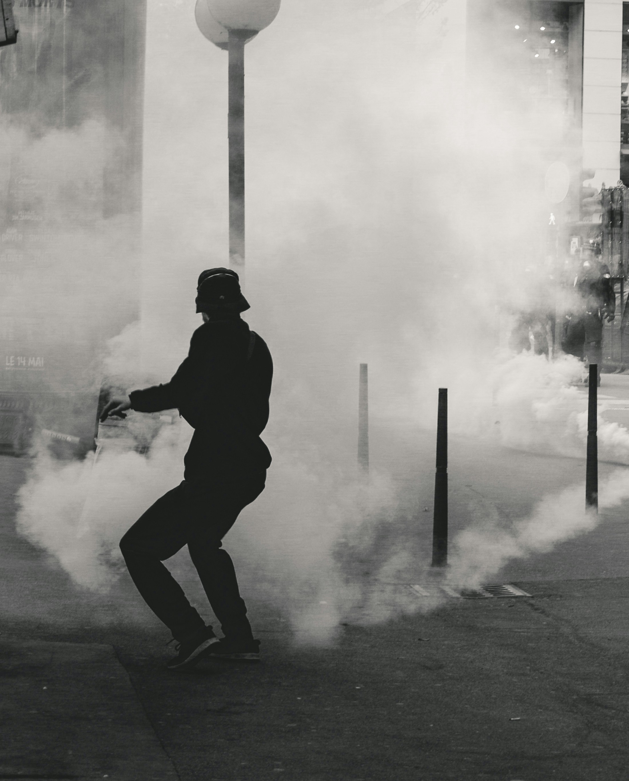 Police fires tear gas at Yellow Vest demonstrators during the 25th weekend of protests in the streets of Lyon, France. Police violence is at its highest since the 1950s. There is an extensive use of tear gas, sting-ball grenades and LBDs (\