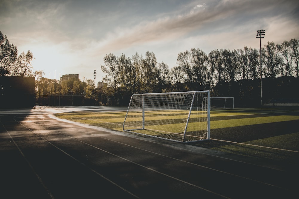 white soccer net during golden hour