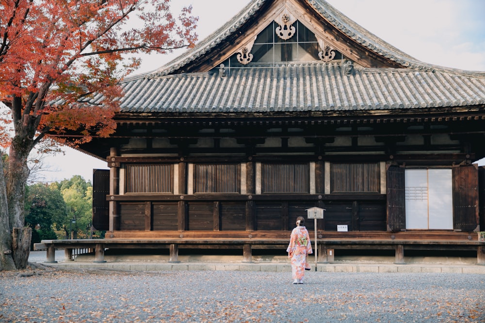 person in front of ancient building during daytime