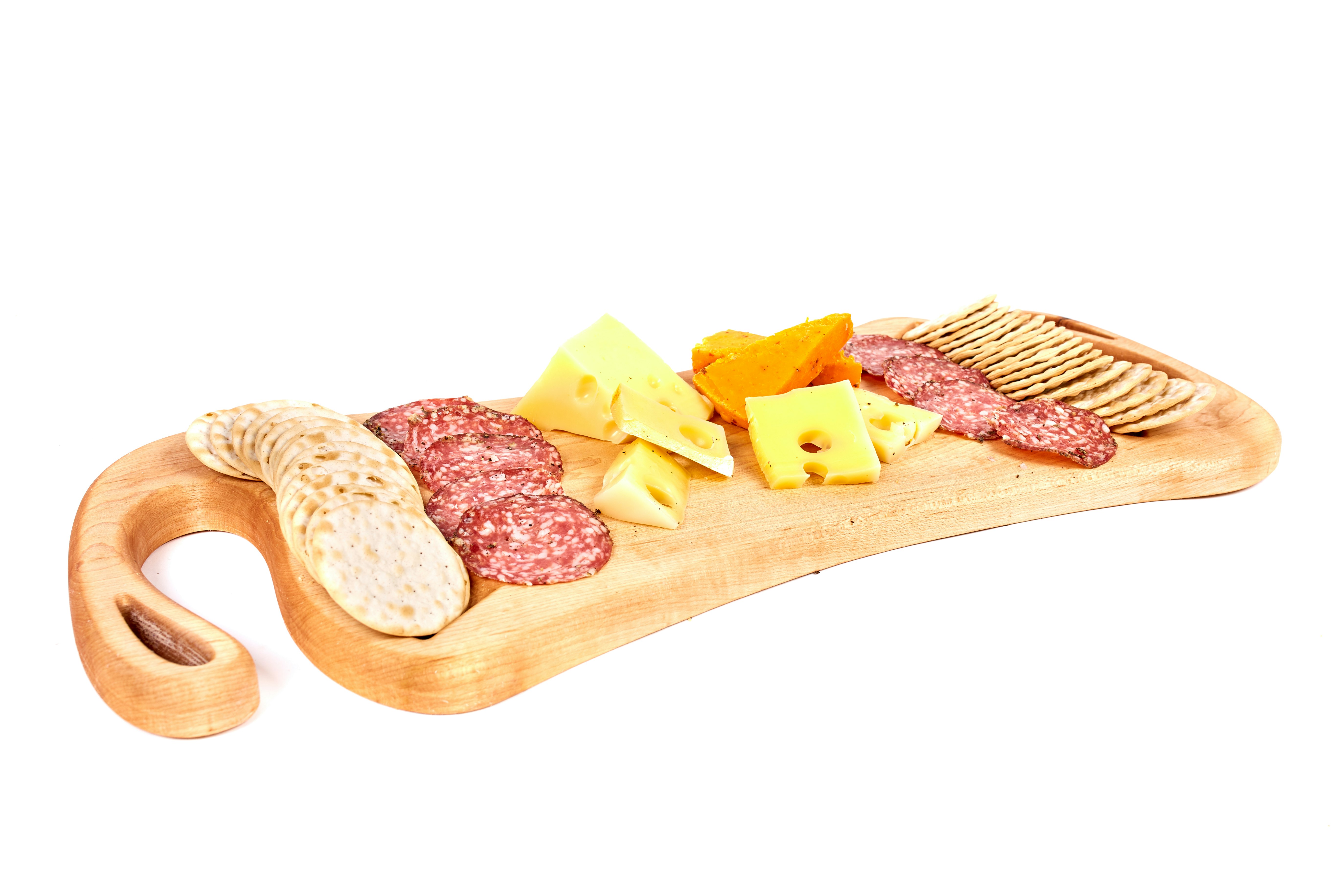 cheese and ham on chopping board