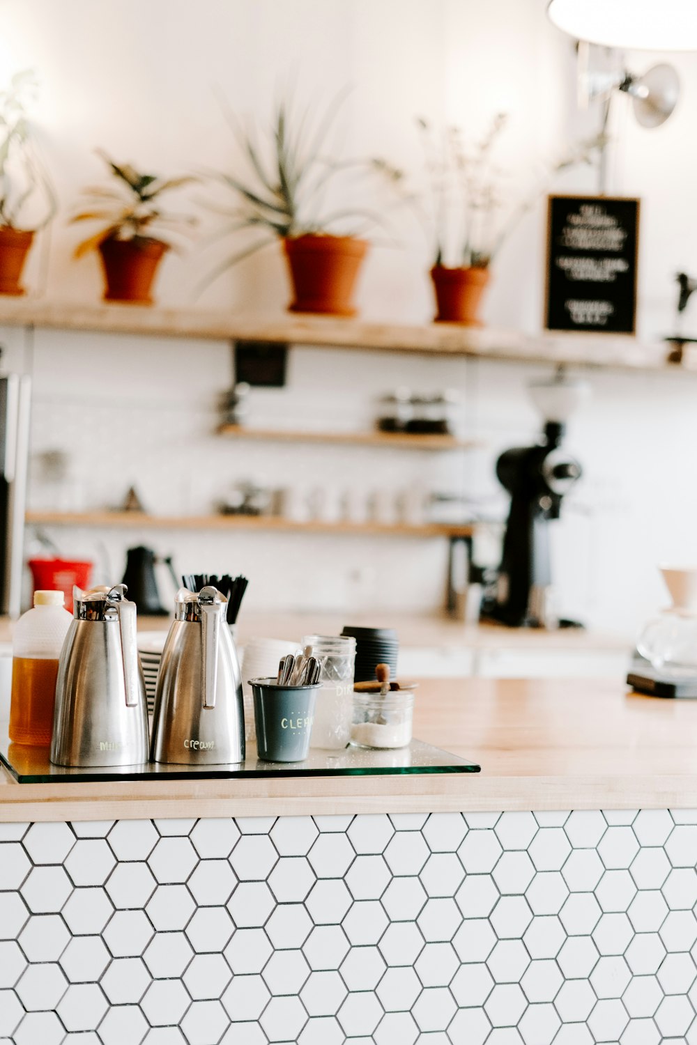 selective photo of condiment shakers on table