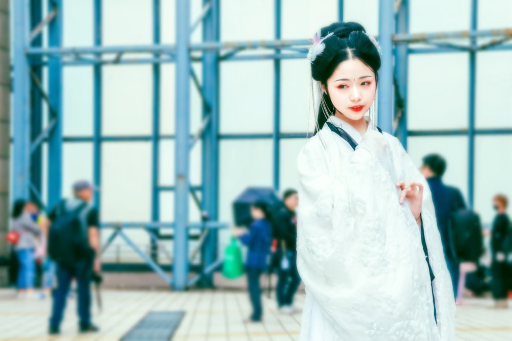 woman wearing white traditional dress