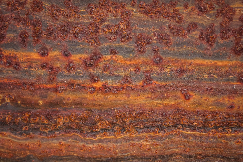 a close up of a rusted metal surface