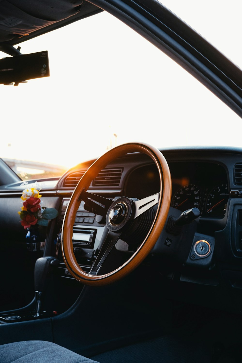 brown and black vehicle steering wheel