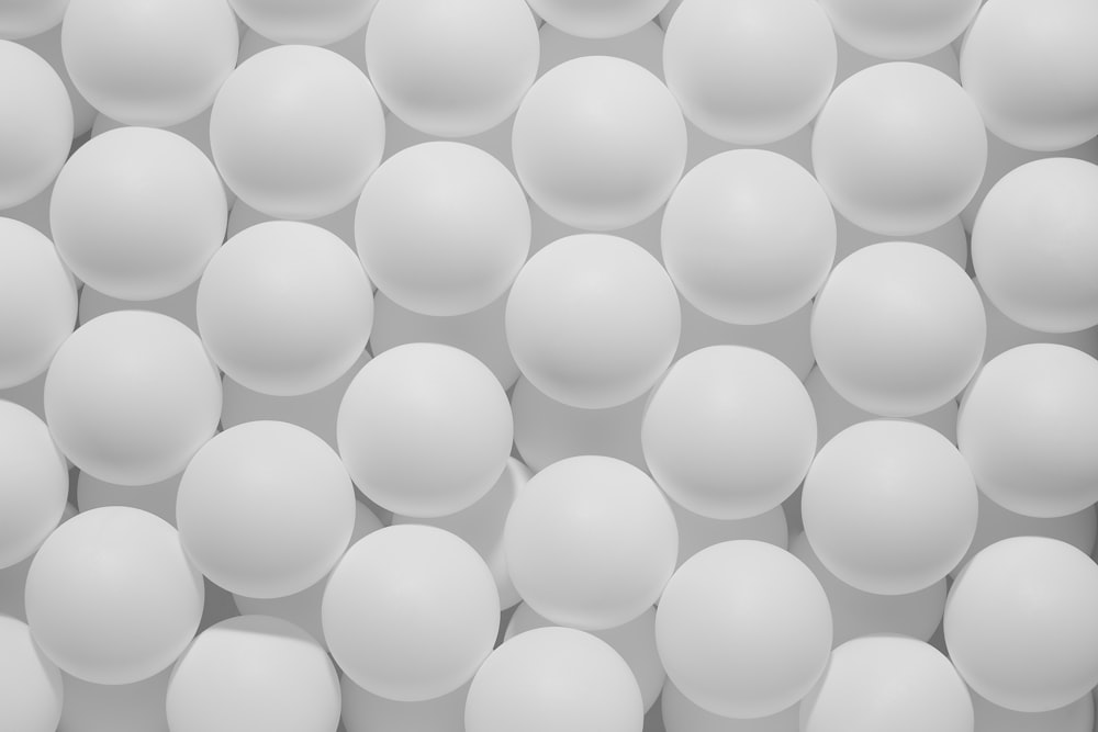 a group of white balls sitting on top of each other