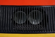 Close-up of the robot’s camera scanning a vent grille inside an air duct.