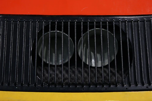 Close-up of a clean ventilation grille with fresh air flowing through.