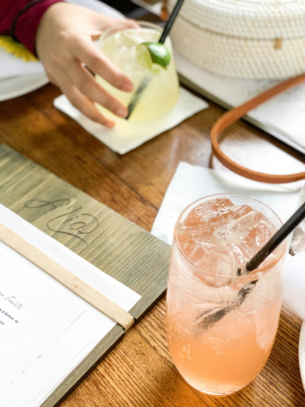 juice in drinking glass with straw