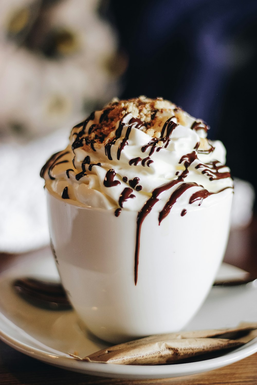 vanilla flavor ice cream with chocolate syrup