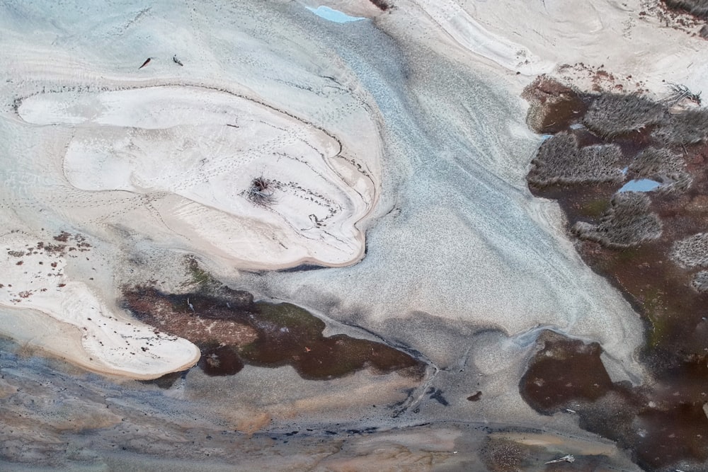 an aerial view of a snow covered landscape