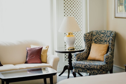 A cozy living room featuring elegant furniture pieces.
