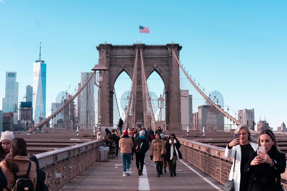 people walking near Brooklyn bridge during daytime